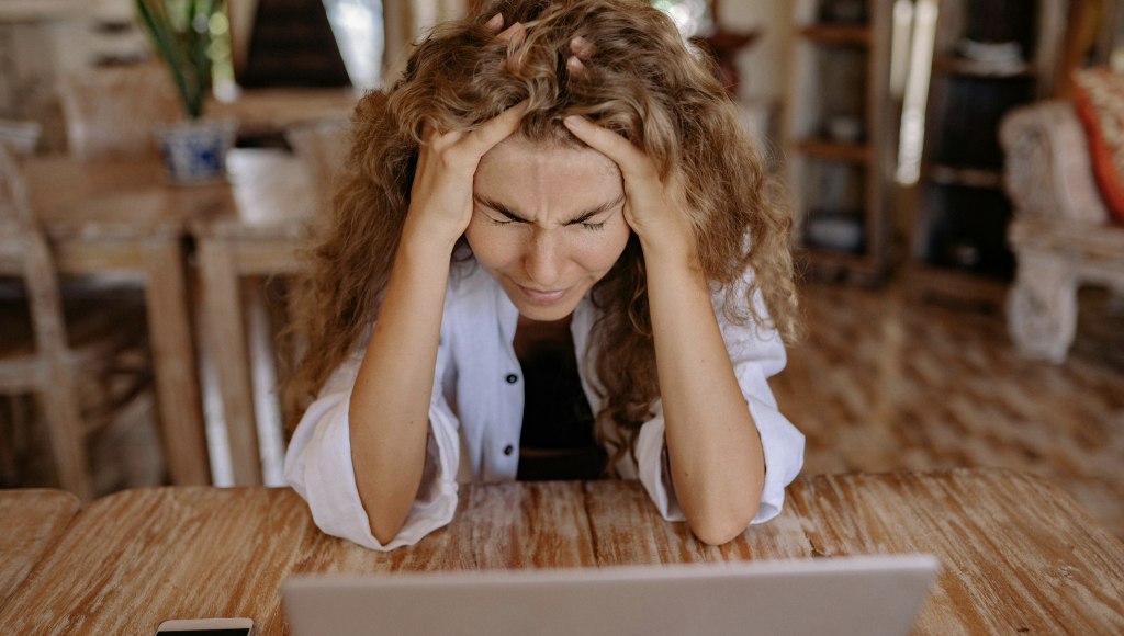 A person who is stressed out at work due to the toxic environment