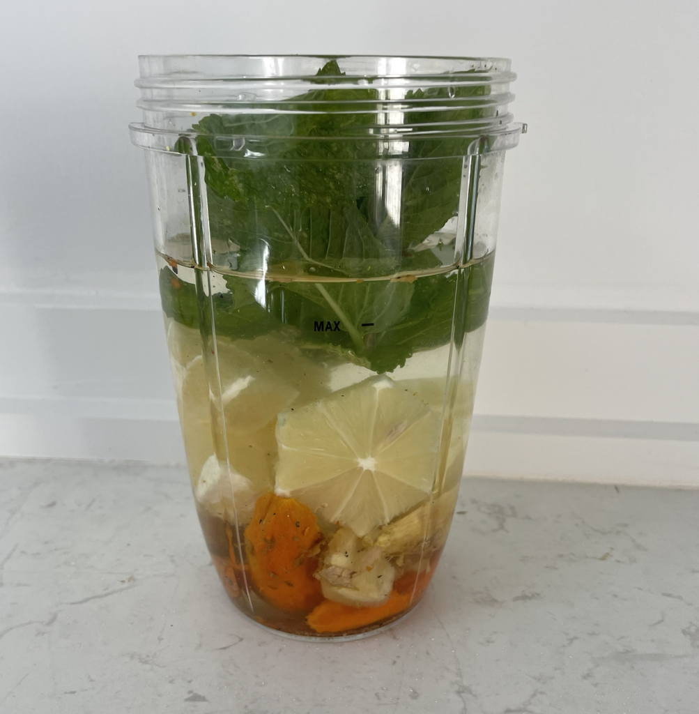 Ginger turmeric lemon mint drink