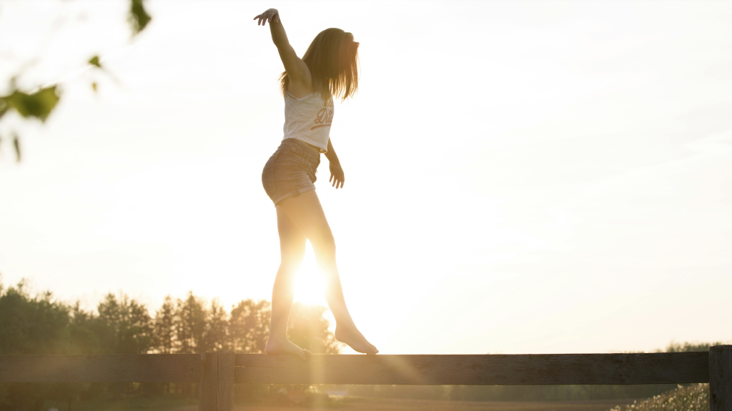 Woman balancing and having a fulfilling life